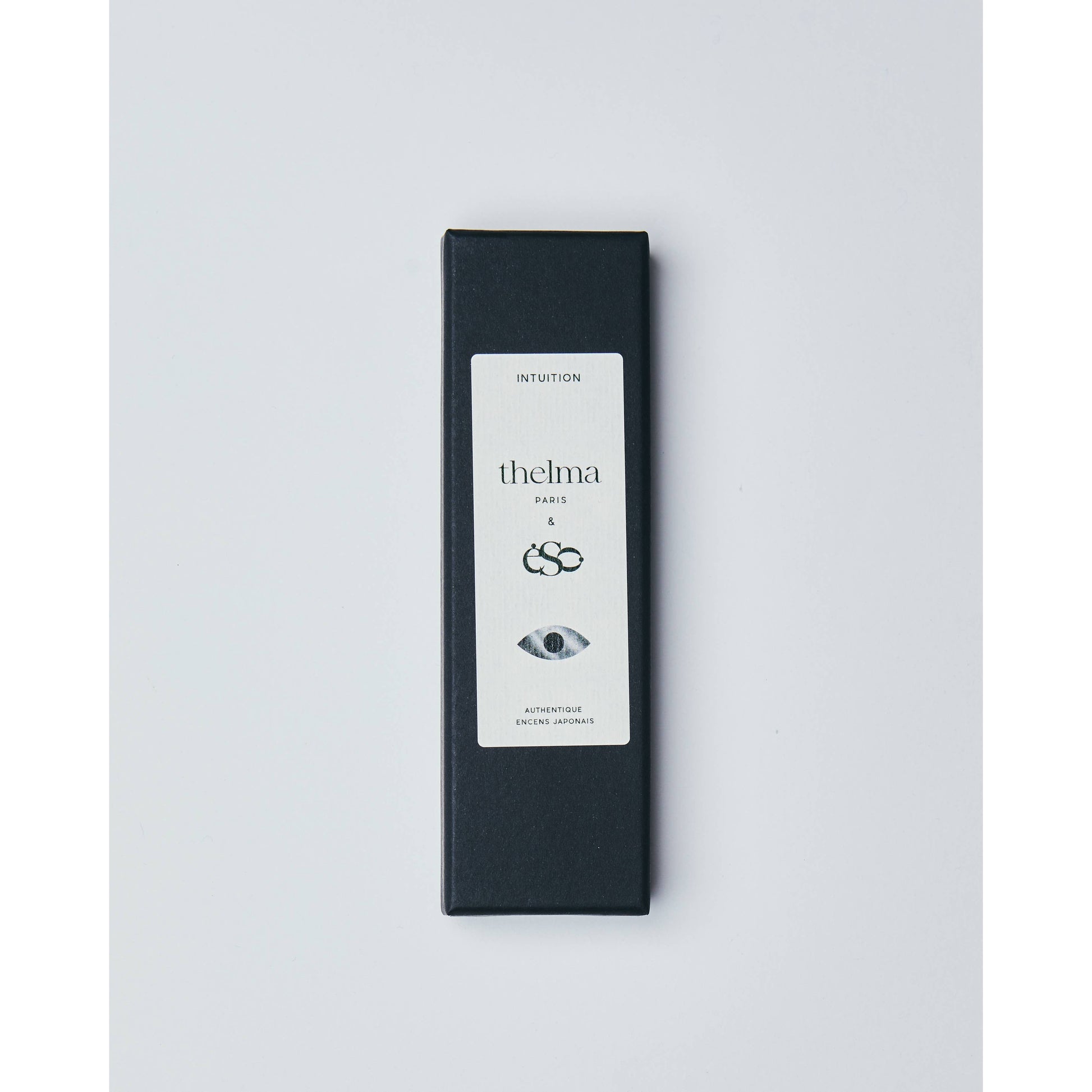 Schwarze Verpackung für japanischen Räucherwerk, minimalistisch, mit Logo und Auge-Design