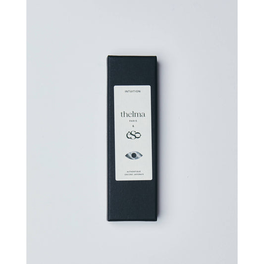 Schwarze Verpackung für japanischen Räucherwerk, minimalistisch, mit Logo und Auge-Design